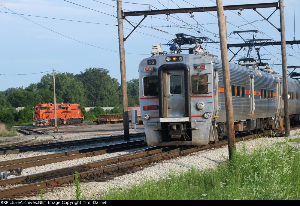 CSS 35 train 110 passes freight yard
